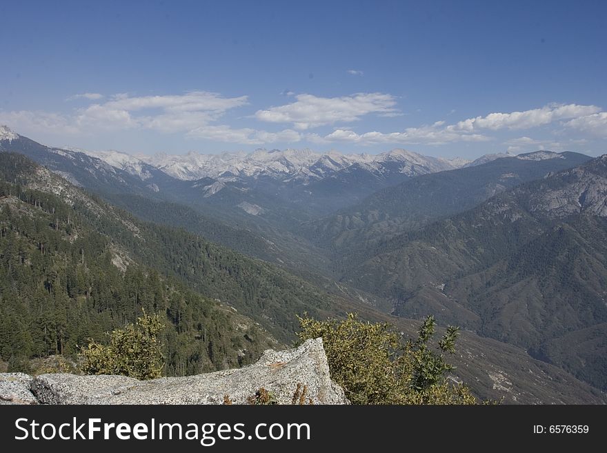 A spectacular view of mountains in California. In the back you can see snow caps on the mountains. A spectacular view of mountains in California. In the back you can see snow caps on the mountains