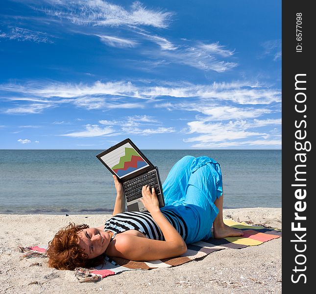 Girl Working On Laptop Near Of Sea