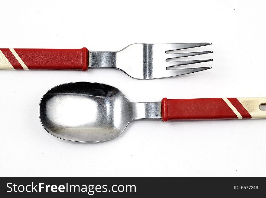 Sppon and fork on a clean white background. Sppon and fork on a clean white background