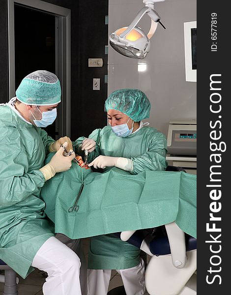 Dentist at work in dental room