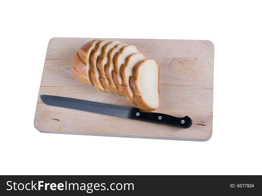 The cut Long loaf on a chopping board, it is isolated, on a white background