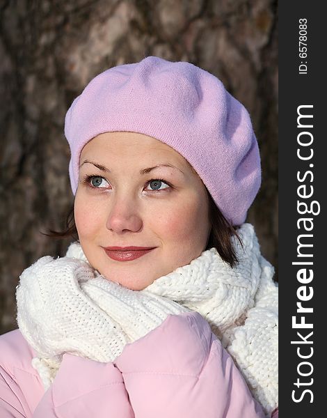 Beautiful smiling girl in pink beret