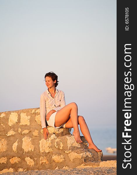 Beautiful girl on the stone steps. Beautiful girl on the stone steps