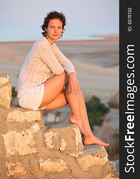 Beautiful girl on the stone steps. Beautiful girl on the stone steps