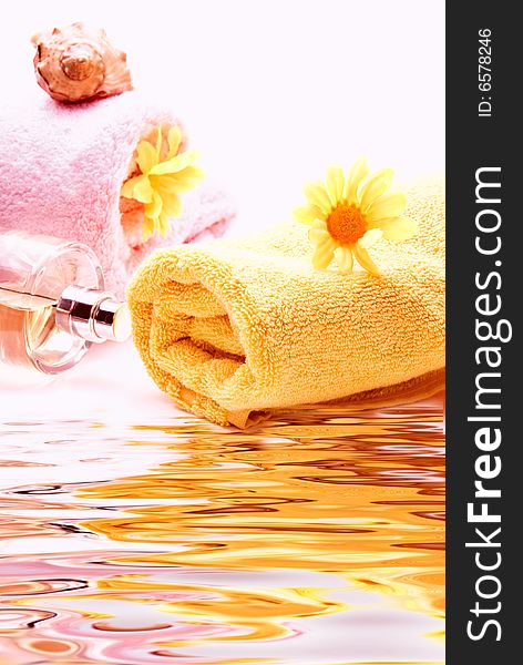 Bath towels with flowers and seashell