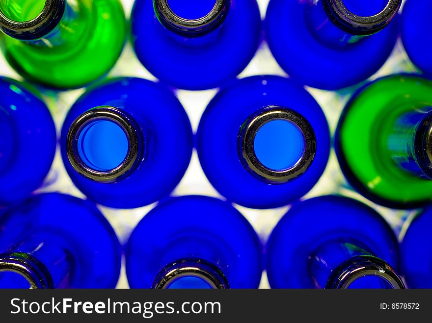 A shot of some blue and green bottles in transmitted light. A shot of some blue and green bottles in transmitted light