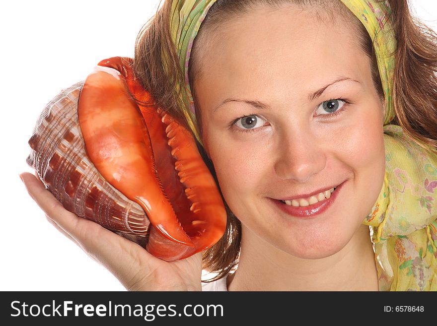 Portrait of Beautiful model with green headscarf and red sea shell