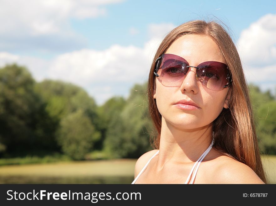 A beauty young woman in sunglasses