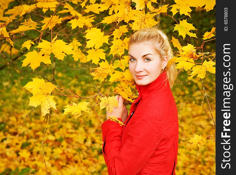 Woman In Autumn Forest