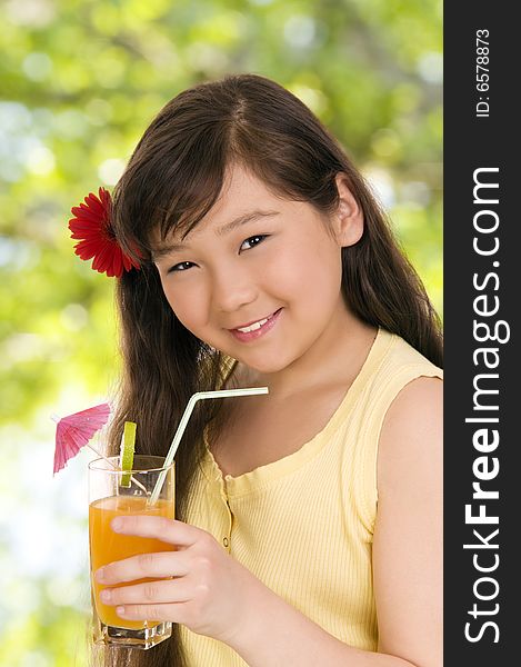 Girl with glass of juice. Girl with glass of juice