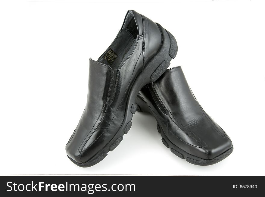 Black woman's shoes on a white background