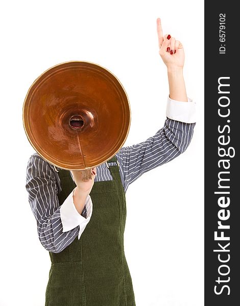 A business woman shouting into a old style megaphone. A business woman shouting into a old style megaphone