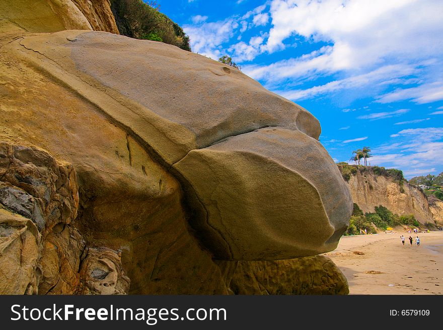 Sandstone lizard overlooking the Pacific ocean. Sandstone lizard overlooking the Pacific ocean