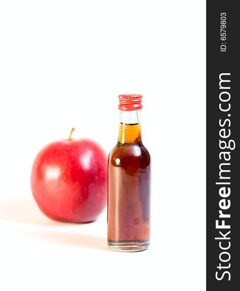 Bottle and apple isolated on white for your design