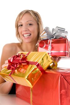 Young Woman Offers Xmas Gifts Stock Image