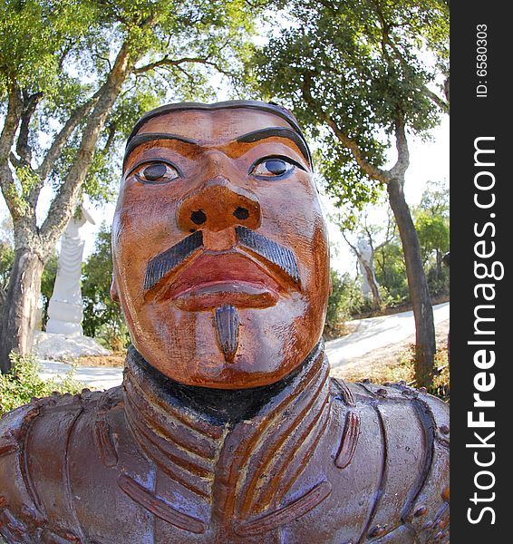 Chinese soldier, Terracotta warrior, Part of a Chinese army in the garden for orient Qta. of Loridos, Bombarral, Portugal. Chinese soldier, Terracotta warrior, Part of a Chinese army in the garden for orient Qta. of Loridos, Bombarral, Portugal