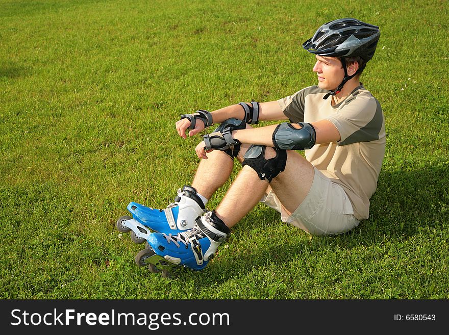 Roller sits on grass