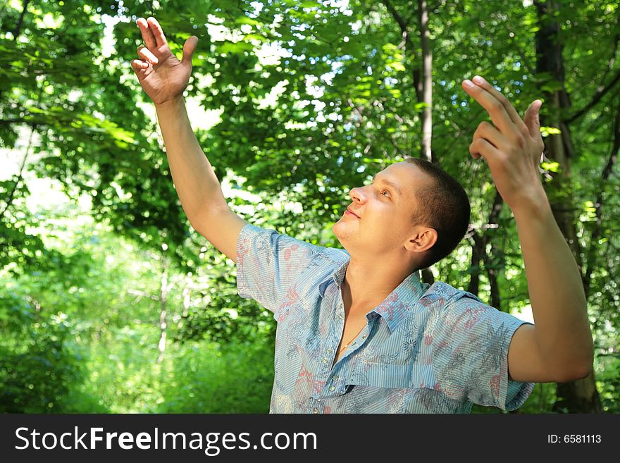 Guy With Rised Hands Like A Director Of Birds