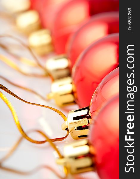 Macro row of red christmas balls