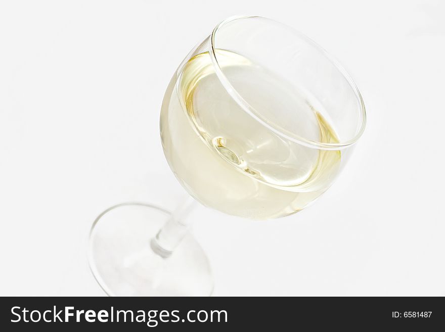 An isolated glass of wine over white background