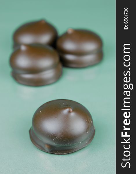 Marshmallow biscuits isolated against a green background