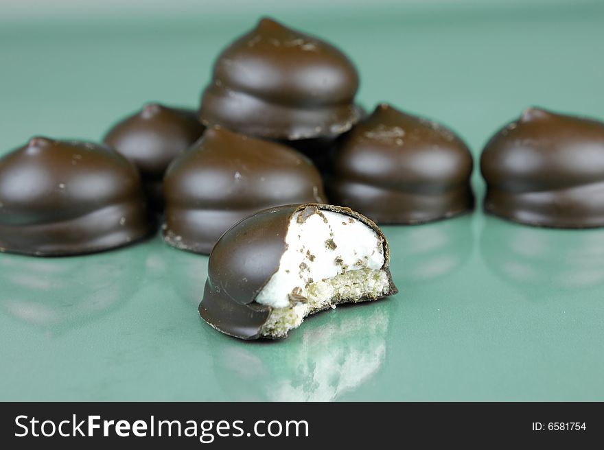 Marshmallow biscuits isolated against a green background