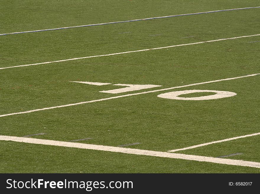 Ten yard line at turf football field