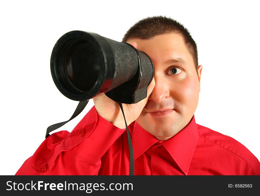 Businessman in red shirt looks in  spyglass on white