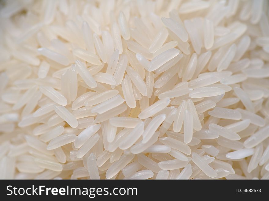 A close up macro image of white rice. A close up macro image of white rice