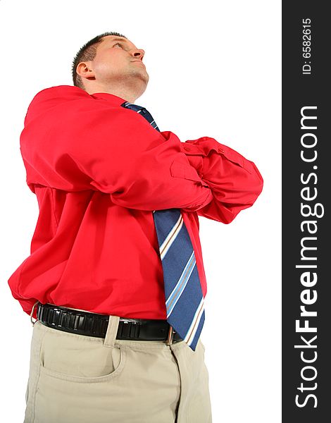 Businessman in red shirt with his hands crossed on white