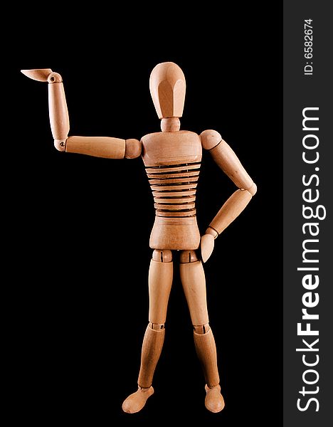 A wooden armature does the little teapot pose. A wooden armature does the little teapot pose