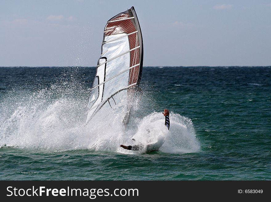 Wind surfer. Windsurfers surfing the waves in the Turkey-Surf-Gokceada. Wind surfer. Windsurfers surfing the waves in the Turkey-Surf-Gokceada