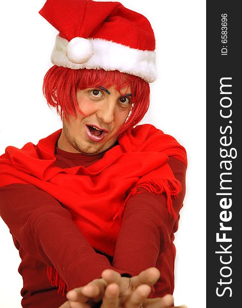 Humorous scene of a young man playing Father Christmas with red wig. Humorous scene of a young man playing Father Christmas with red wig