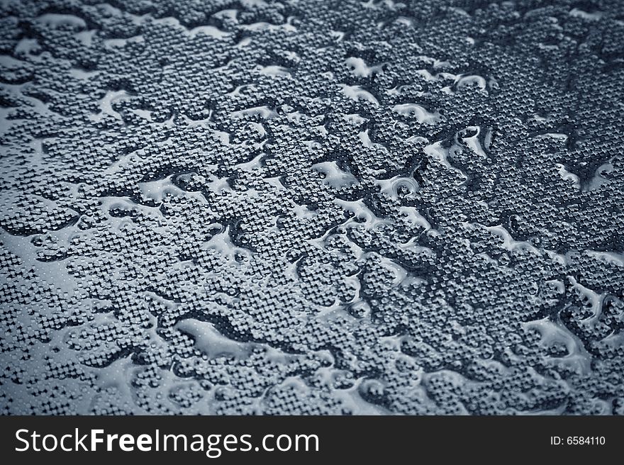 Abstract background of waterdrops on textile texture. focus on the center. Abstract background of waterdrops on textile texture. focus on the center