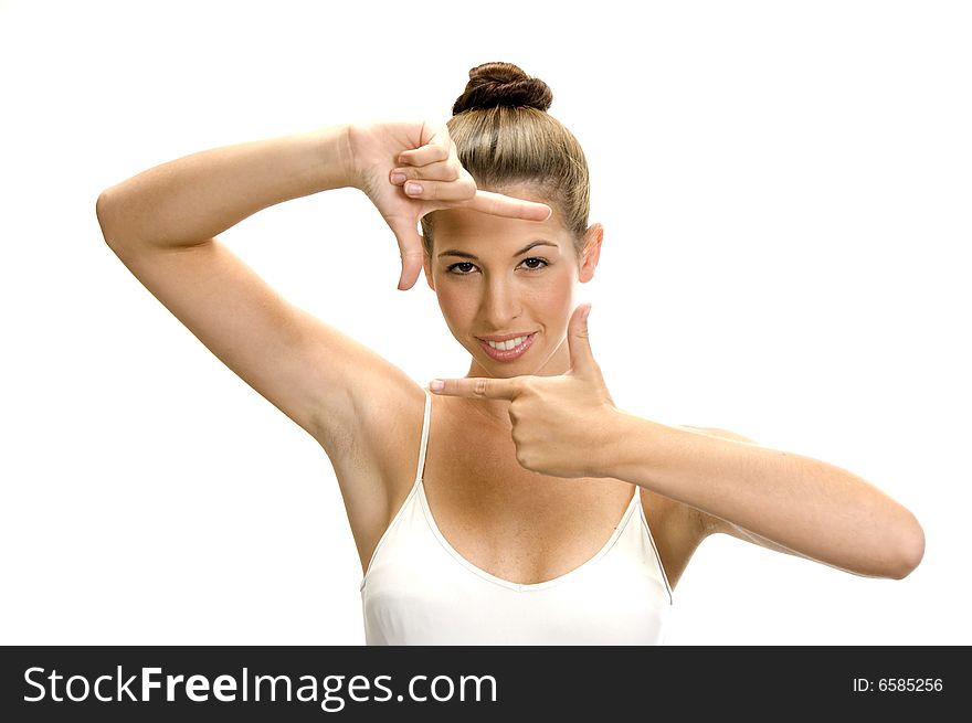 A white woman showing framing hand gesture