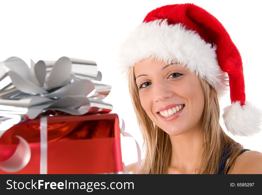 Closeup portrait of a beautiful woman dressed as Santa and holding a gift isolated on white background. Closeup portrait of a beautiful woman dressed as Santa and holding a gift isolated on white background