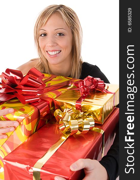 Young  smiling woman embraces Christmas gifts. Young  smiling woman embraces Christmas gifts
