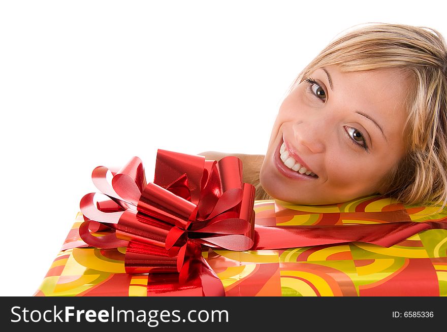 Smiling woman gifts with tender expression loos at the camera.Isolated image on white background. Smiling woman gifts with tender expression loos at the camera.Isolated image on white background