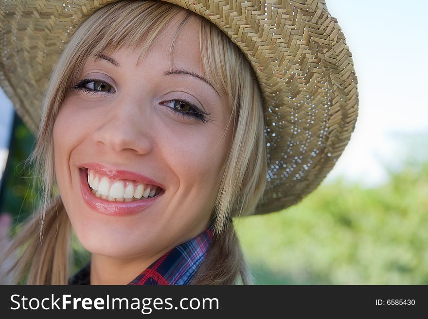 Closeup Portrait Of A Happy Young Peasant Woman