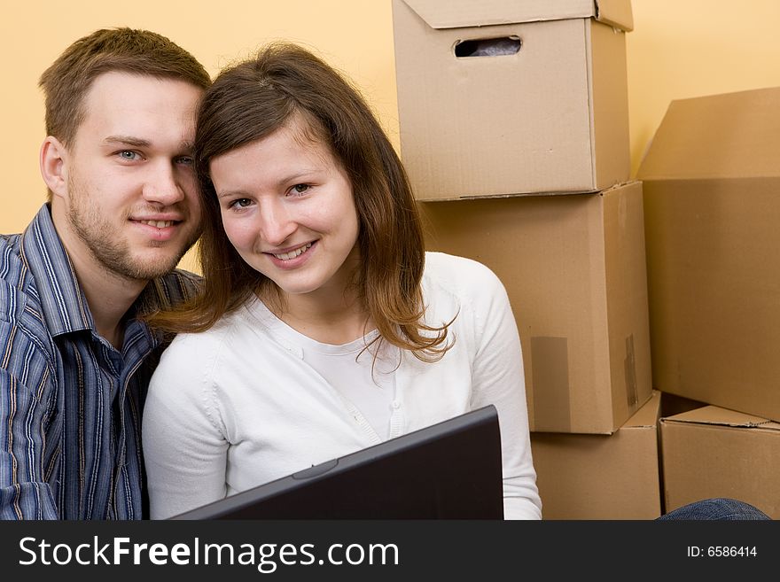 Casual couple moving in new home