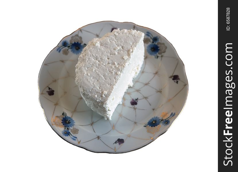 Cheese part on a plate on a white background