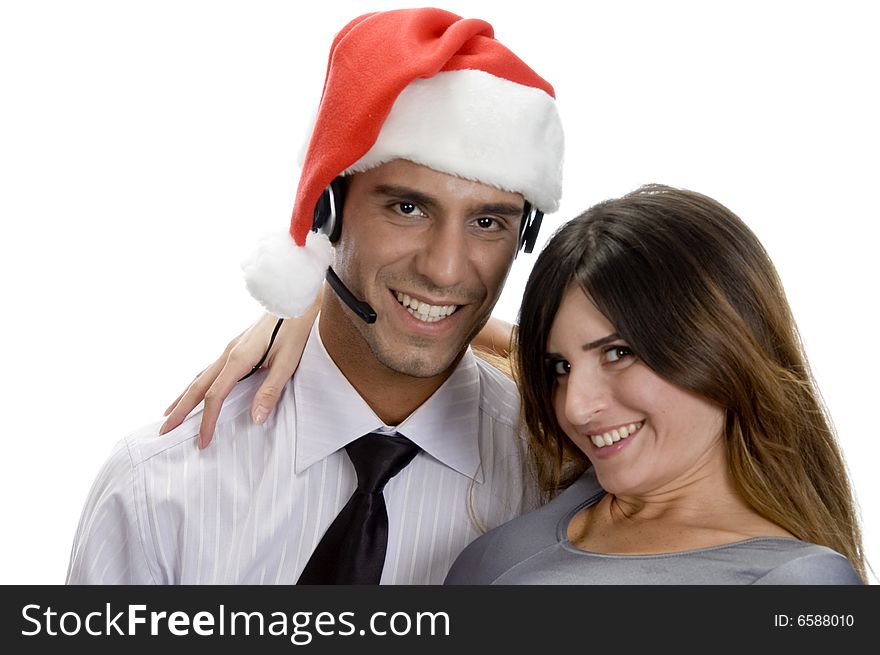 Smiling young couple against white background