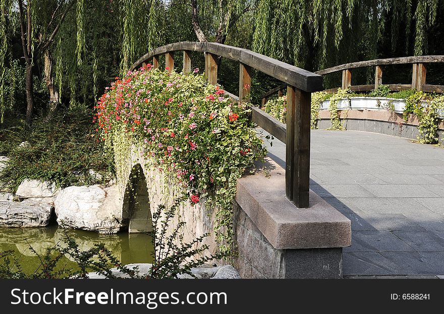 Bridge with flowers, stone bridge