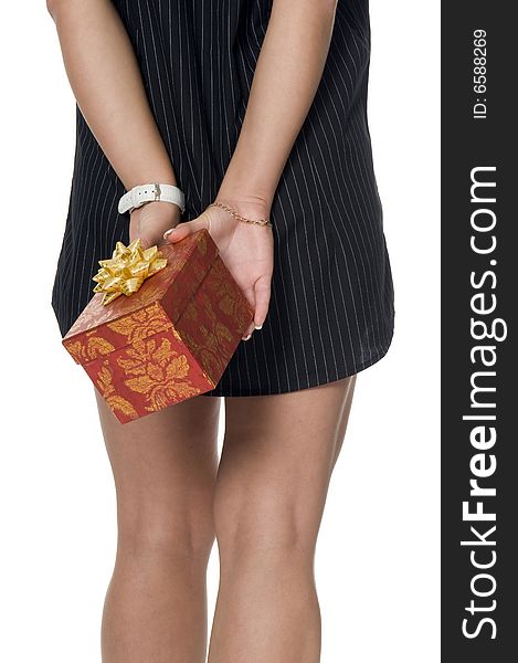 Woman keeps in the hand the red box with the present