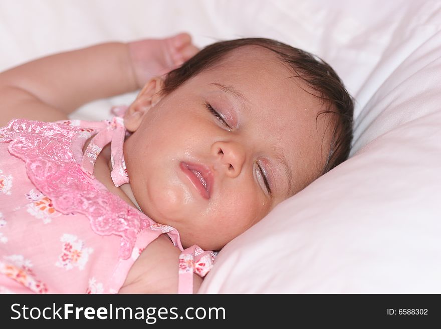 Cute baby girl sleeping in her bed. Cute baby girl sleeping in her bed