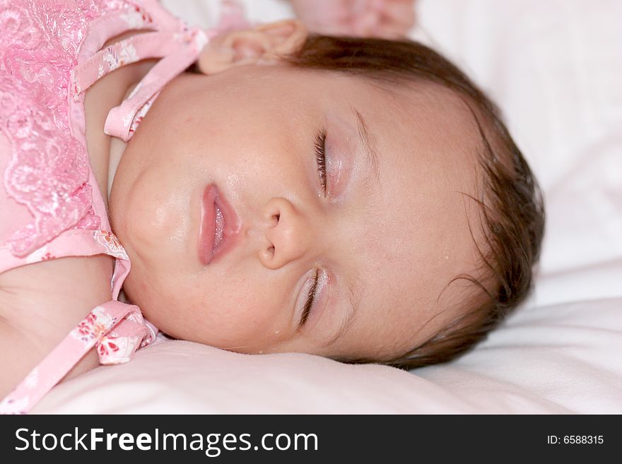 Cute baby girl sleeping in her bed. Cute baby girl sleeping in her bed