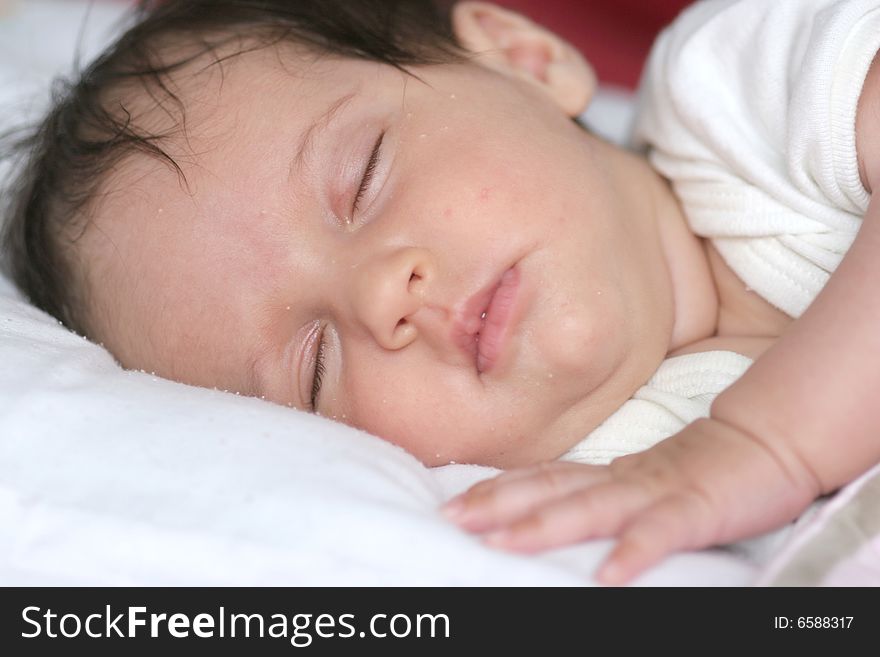 Cute baby girl sleeping in her bed. Cute baby girl sleeping in her bed