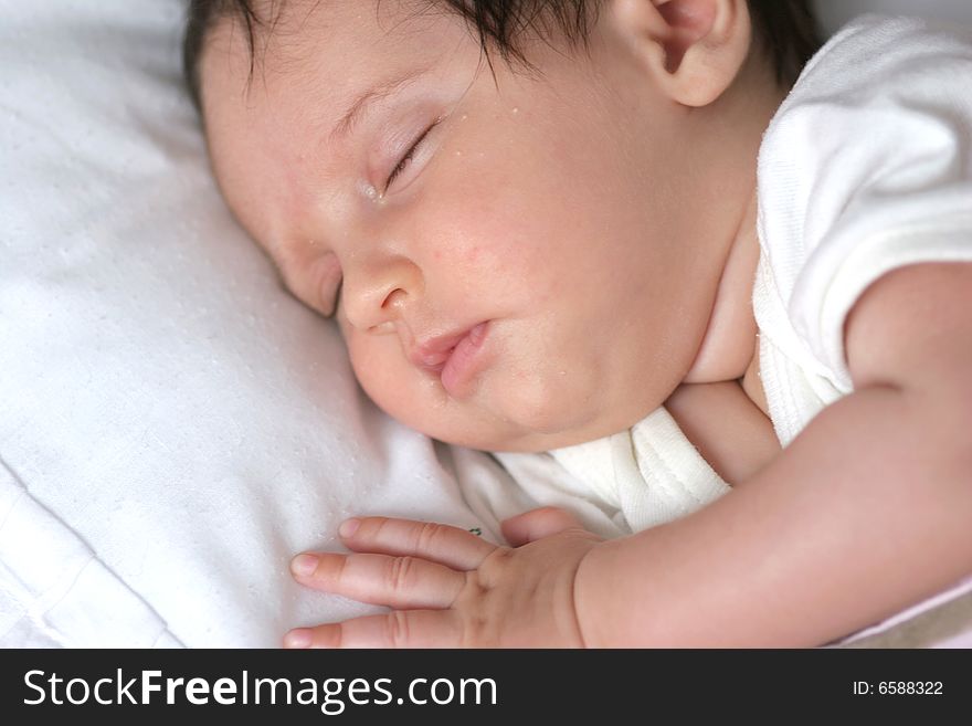 Cute baby girl sleeping in her bed. Cute baby girl sleeping in her bed