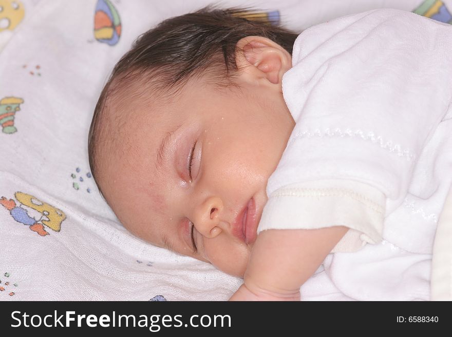 Cute baby girl sleeping in her bed. Cute baby girl sleeping in her bed