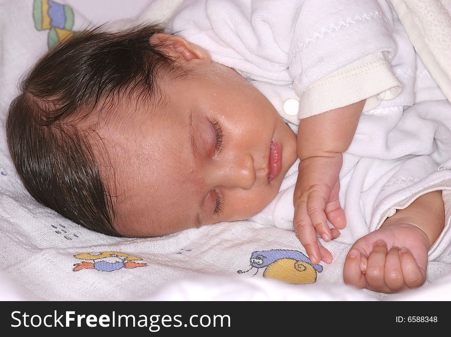 Cute baby girl sleeping in her bed. Cute baby girl sleeping in her bed